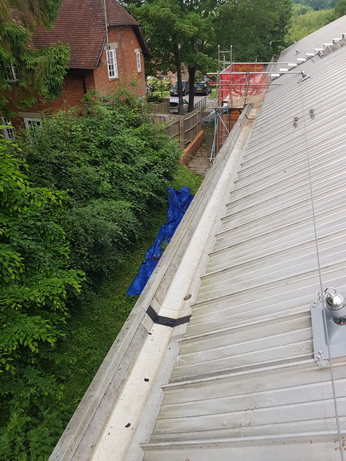 Commercial property after full gutter clearance service